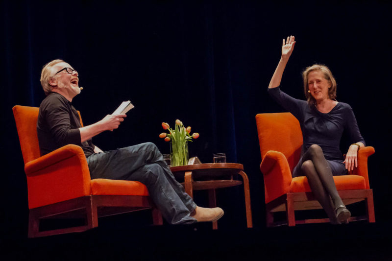 Mary Roach in conversation with Adam Savage in June 2016 - laughing onstage